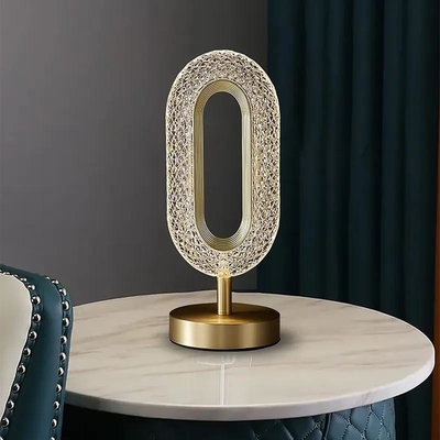 Lampada da tavolo acrilica del metallo LED della camera da letto di comodino dell'oro moderno della lampada